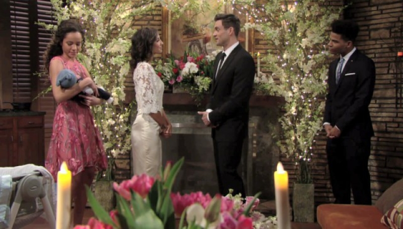 Lily (Christel Khalil) et Cane (Daniel Goddard) renouvellent leurs voeux entourés de leurs enfants. Les Feux de l'Amour,
                     épisode 11368 (14 février 2018,
CBS)