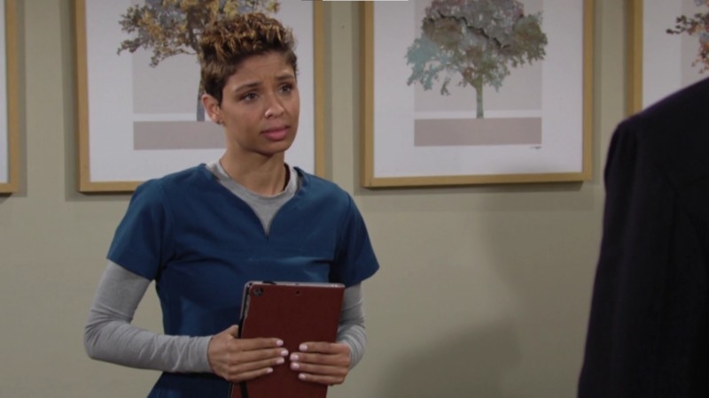 Elena (Brytni Sarpy) se charge d'annoncer la mauvaise nouvelle à Adam. Les Feux de l'Amour,
                     épisode 8760 (12 juillet 2023,
TF1)