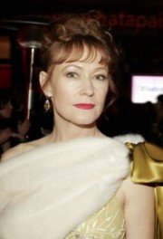 Ann Magnuson,                                     actrice                                                                        dans Les Feux de l&#039;Amour