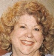 Christy Dooley,                                                         technicienne                                                    dans Amour, Gloire et Beauté