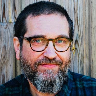 Biographie de Mark Lesser